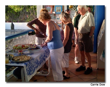 Guests peruse the hors d'oeuvres offered at Estern’s Sunset Party.